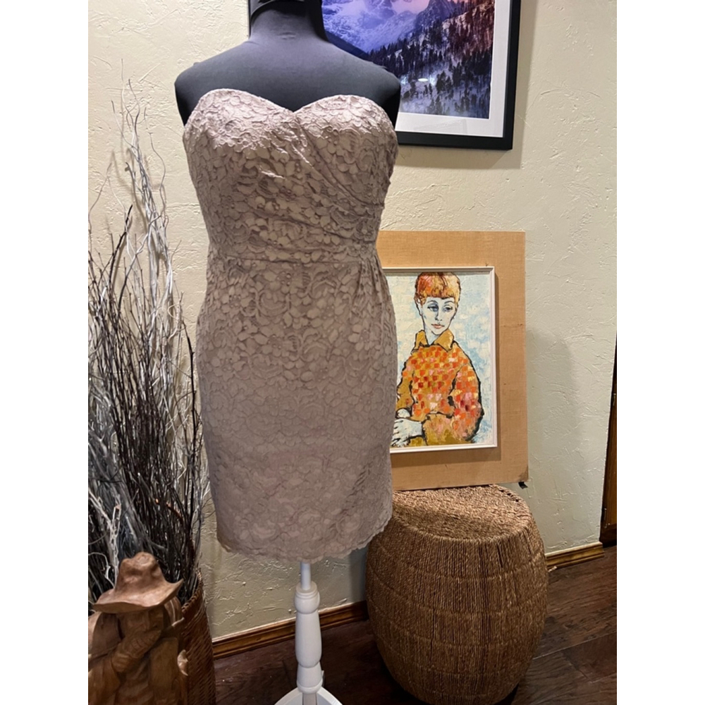 Strapless lace formal above knee, size 16. Like new. Fully lined.